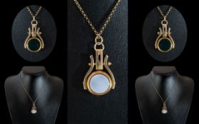 15ct Gold - Stone Set Swivel Fob Attached to a Later 9ct Gold Chain.