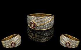 18ct Gold Stunning Ladies Diamond & Ruby Set Band Ring, of impressive design and style.