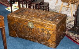 A Heavily Carved Camphor Wooden Blanket Chest.