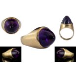 9ct Gold Ring Set with a Rare Carved Brazilian Untreated Amethyst, carved by a master craftsman.