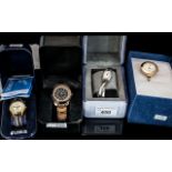 Four Fashion Watches, all in original boxes,