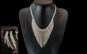 Clear Crystal Waterfall Necklace and Earrings Set, a fully articulated, V shaped,