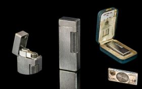 Dunhill Gent's Silver Tone Cigarette Lighter, with box and papers, circa 1960's.