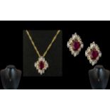 Ladies Attractive 14ct Gold Ruby & Diamond Set Pendant Drop, with attached 14ct gold fancy chain.