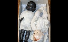 Two Vintage Dolls, comprising a black baby doll by Pedigree, moveable limbs, shutting eyes,