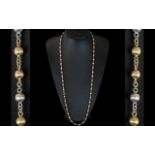 A Superior Quality 9ct Two Tone Gold Fancy Long Chain with Baubles Design, White and Yellow Gold.