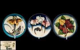 Moorcroft - Fine Hand Painted Trio of Tube lined Coasters. All with Floral Decoration, Dates 2001.