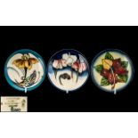 Moorcroft - Fine Hand Painted Trio of Tube lined Coasters. All with Floral Decoration, Dates 2001.