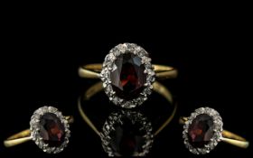 Ladies 18ct Gold Attractive Diamond and Fire Garnet Set Cluster Ring.