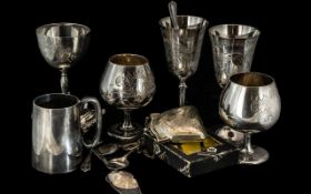 Collection of Silver Plated Ware, comprising tankards, various flatware, a purse on chain, and a