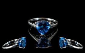 Swiss Blue Topaz Solitaire Ring, a trillion cut, bright blue, topaz of over 3cts,