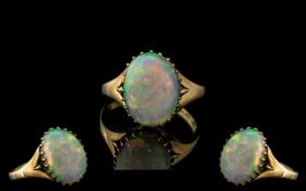 Ladies Attractive 9ct Gold Single Opal Set Ring. Excellent Colour. With Full Hallmark for 9ct.