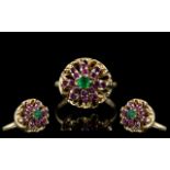 Ladies Attractive 14ct Gold Ruby and Emerald Set Cluster Ring. The Central Emerald Surrounded by a