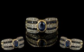 Ladies 9ct Gold Contemporary Designed Sapphire and Diamond Set Ring.