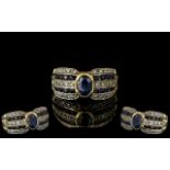 Ladies 9ct Gold Contemporary Designed Sapphire and Diamond Set Ring.