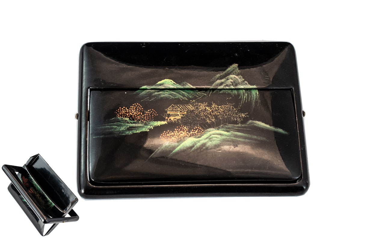 Japanese Cigarette Case in a lacquered box, depicting a typical scene,