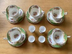 A Paragon Rockingham Design Part Teaset comprising 4 egg cups, 5 tea cups, 5 saucers,