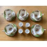 A Paragon Rockingham Design Part Teaset comprising 4 egg cups, 5 tea cups, 5 saucers,