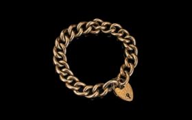 Antique Period 9ct Gold Curb Bracelet with Heart Shaped Padlock. All Links Marked 9ct.