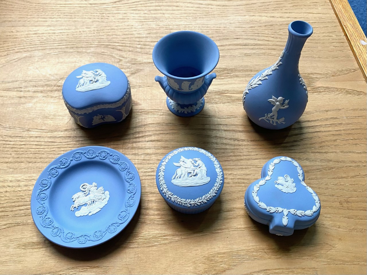A Collection of Six Wedgwood Blue Jasper Ware Pieces including various trinkets and a bud vase and