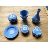 A Collection of Six Wedgwood Blue Jasper Ware Pieces including various trinkets and a bud vase and