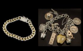 A Vintage Sterling Silver Charm Bracelet, loaded with 13 silver charms,