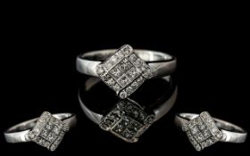 18ct White Gold - Attractive and Well Designed Diamond Set Dress Ring. Marked 750 - 18ct to Shank.