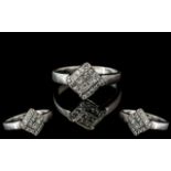 18ct White Gold - Attractive and Well Designed Diamond Set Dress Ring. Marked 750 - 18ct to Shank.