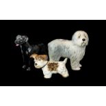 Collection of Three Sylvac Dogs, comprising a Sheepdog, a Black Labrador,