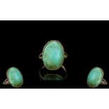 A Large & Impressive Single Stone Turquoise Set Ring, set in 9ct gold. Circa early 20th Century.