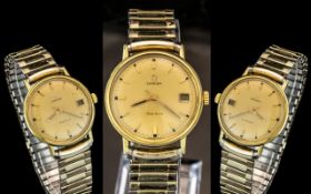 Omega Gents Gold on Steel Mechanical Wind Wrist Watch. c.