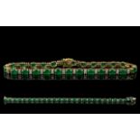 14ct Yellow Gold Attractive Emerald and Diamond Set Line Bracelet. Marked 14ct - 585.