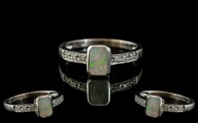 Ladies 9ct Gold - Attractive Opal and Diamond Set Ring. Fully Hallmarked for 9.375.