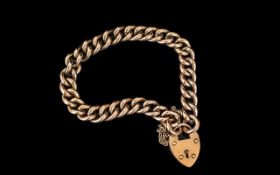 Edwardian Period - Attractive Warm Coloured 9ct Gold Curb Bracelet with Heart Shaped Padlock /