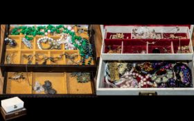 Two Jewellery Boxes Containing Costume Jewellery, including beads, brooches, earrings, rings,