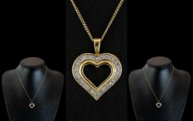 9ct Gold Heart Shaped Diamond Set Pendant with Attached 9ct Gold Chain. Both Pendant and Chain