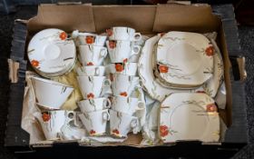 Wellington China Tea Set by J H C & C, England, in Art Deco style decoration, comprising milk jug,