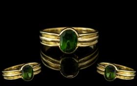 18ct Gold Single Stone Emerald Set Dress Ring. The Faceted Emerald Requires - Re-Polishing.