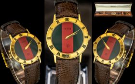 Gucci Ladies 18ct Gold Plated Slim line Quartz Wrist Watch. Ref 3100 - 027 - 898.