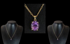 Ladies 9ct Gold Attractive Amethyst Set Pendant Drop, Attached to a 9ct Gold Fancy Chain.