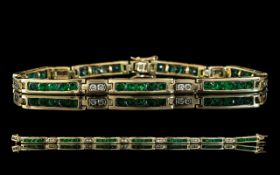 Ladies - Attractive 14ct Gold Emerald and Diamond Set Bracelet. Marked 14ct - 585.