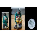 Royal Doulton 'The Mask Seller' HN 2103, 9" tall, depicting a man with masks and a flute.