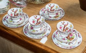 Chelsea Porcelain 'Birds' Trios, comprising four cups, saucers and side plates, in white ground with