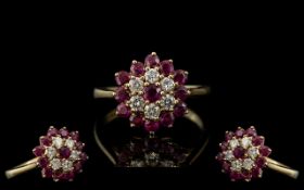 Ladies 9ct Gold Attractive Ruby & Diamond Set Ring, flower head setting. Full hallmark for 9.375.