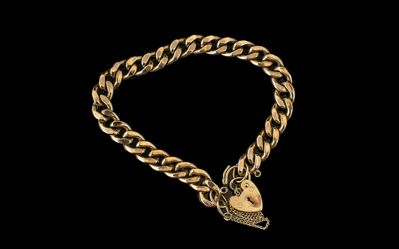 9ct Gold - Pleasing Curb Bracelet with Heart Shaped Padlock and Safety Chain, Marked 9.375. Length 7