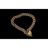 9ct Gold - Pleasing Curb Bracelet with Heart Shaped Padlock and Safety Chain, Marked 9.375. Length 7