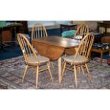 1970's Ercol Dining Table & Four Chairs, all labelled for Ercol.