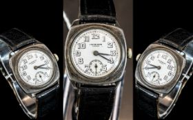 J W Benson 1930's Silver Cased Mechanical Wrist Watch, with original leather watch strap.