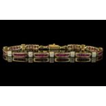 Ladies - Attractive 14ct Gold Ruby and Diamond Set Bracelet. Marked 14ct - 585.