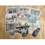 A Collection of Bank Notes and Military Items including various notes - France, Portugal, Germany.